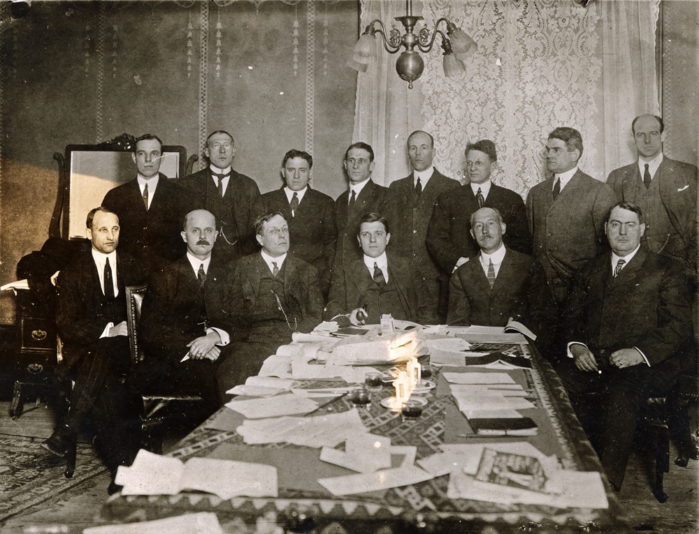 Football Rules Committee at the February 3, 1911 session, held in the Hotel Cumberland, New York City. Standing, from left: Lieutenant V. W. Cooper, West Point; Dr. H. L. Williams, Minnesota; A. A. Stagg, Chicago; S. C. Williams, Iowa; Lieutenant F. D. Berrien, Annapolis; Professor C. W. Savage, Oberlin; Captain Joseph Beacham, Cornell; and Percy Haughton, Harvard. Sitting: Dr. Carl Williams, Pennsylvania; Dr. James W. Babbitt, Haverford; Dr. W. L. Dudley, Vanderbilt; E. K. Hall, Dartmouth; Walter Camp, Yale; and Parke H. Davis, Princeton.